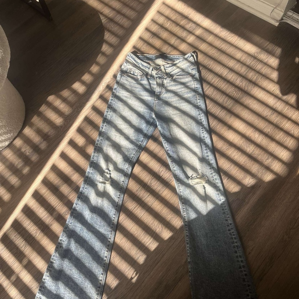 Buckle Light Blue Flare Jeans